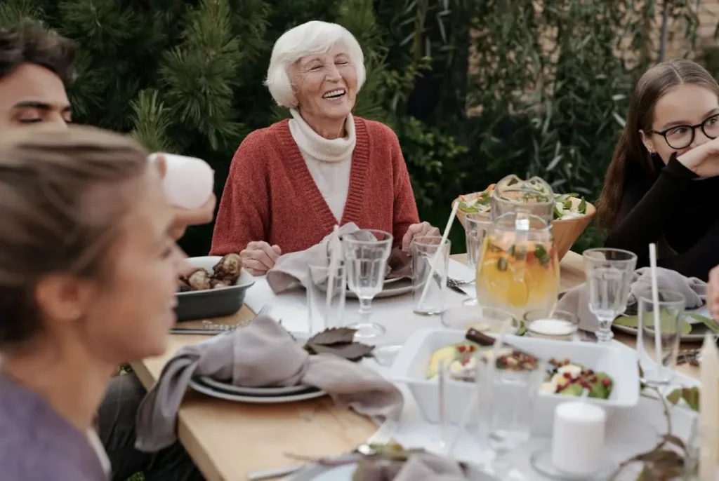 lady smiling at table 